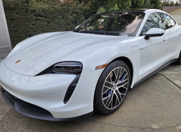 White Porsche Taycan after exterior mobile car detailing
