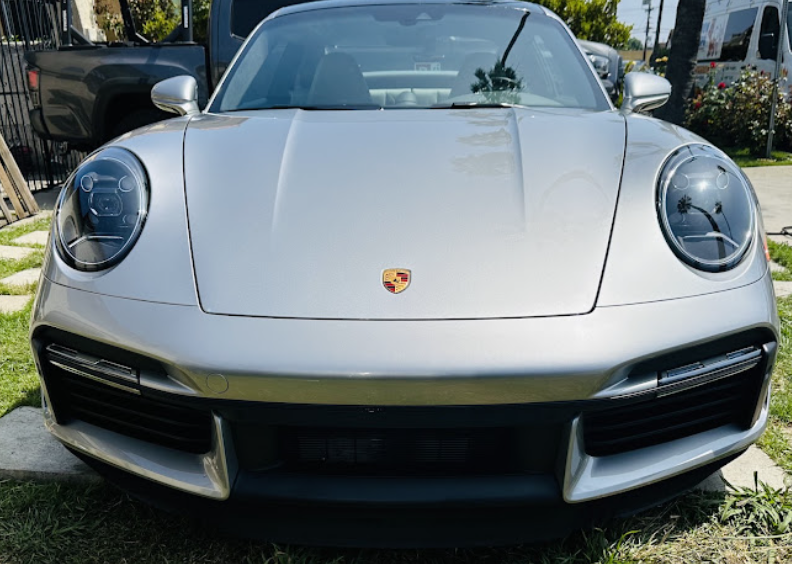 Silver Porsche 911 Turbo front end after a hand wash and paint sealant